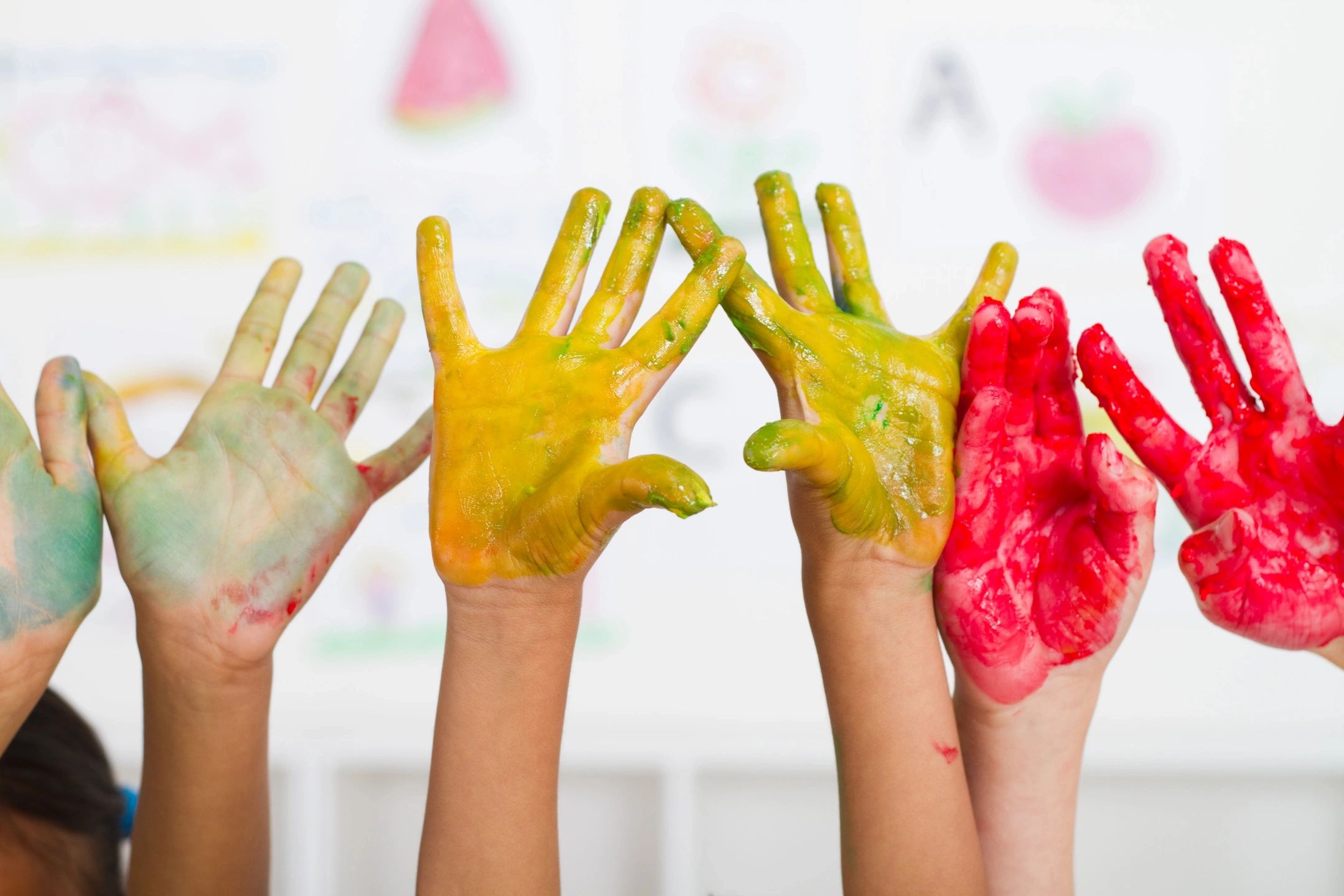 Children's hands with paint